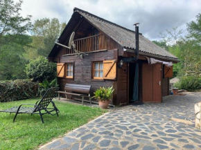 Casa de madera en plena naturaleza
